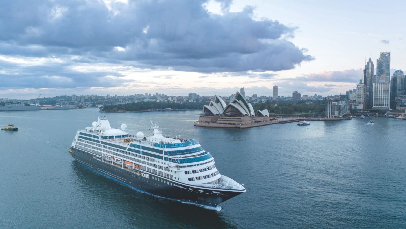 An Azamara luxury cruise ship sailing into Sydney harbour